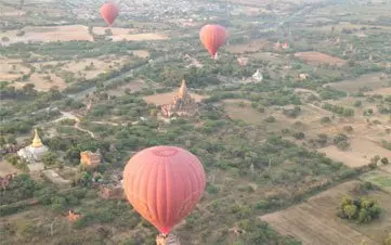 Balloon Flights Over Bagan Fly Towards The Rising Sun