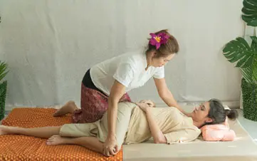 yoga like position in thai massage